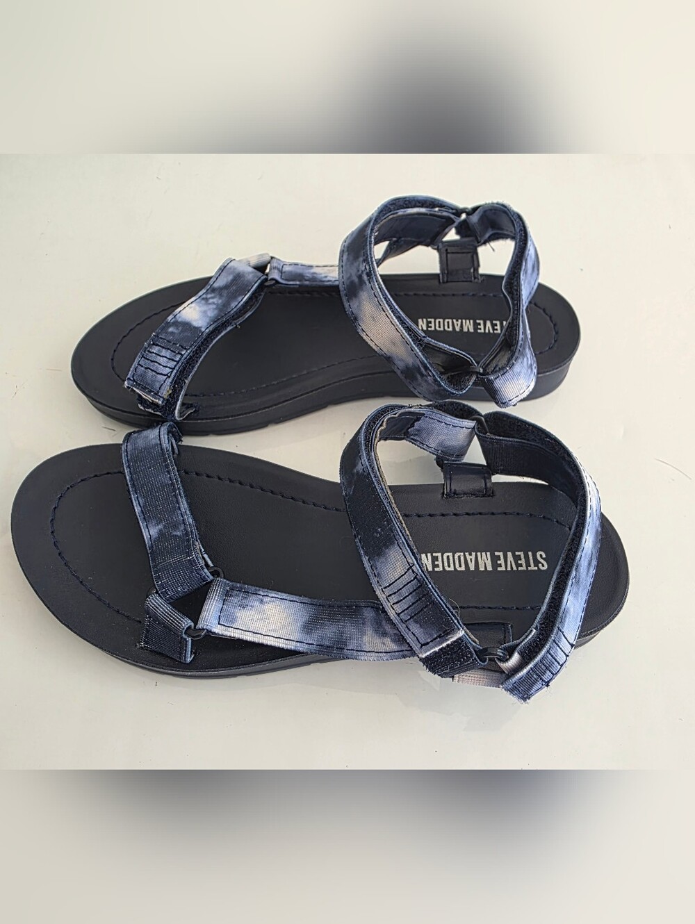 Steve Madden Kids Navy Tie-Dye Strap Sandals with Black Footbed.